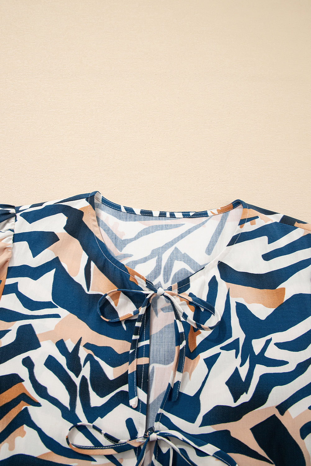 Zebra Print Tied Front Puff Sleeve Top