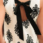 Geometric Printed Sleeveless Hollowed Bowknot Back Mini Dress
