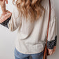 Textured Patchwork Sleeve Drawstring Top