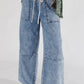 Acid Wash Exposed Seam Drawstring High Waist Jeans
