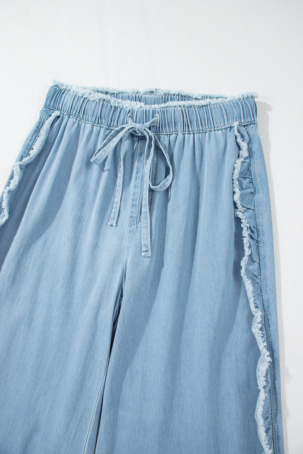 Light Wash Raw Hem Ruffled Wide Leg Jeans