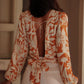 Floral Print Knotted Open Back Long Sleeve Blouse