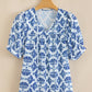 Geometric Print Tassel Drawstring V Neck Blouse