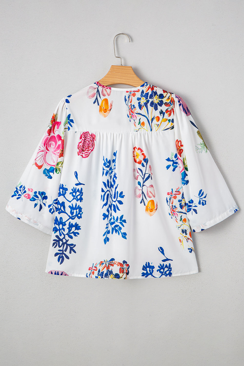 Floral Print Tassel Tie Bracelet Sleeve Flowy Blouse