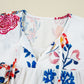 Floral Print Tassel Tie Bracelet Sleeve Flowy Blouse