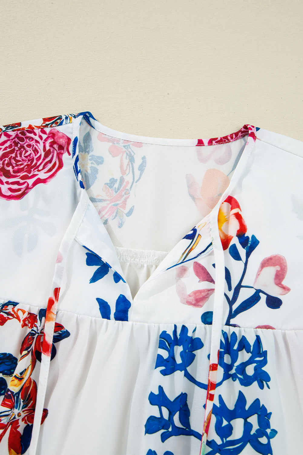 Floral Print Tassel Tie Bracelet Sleeve Flowy Blouse