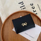 Lady's Purse With Bow Tie