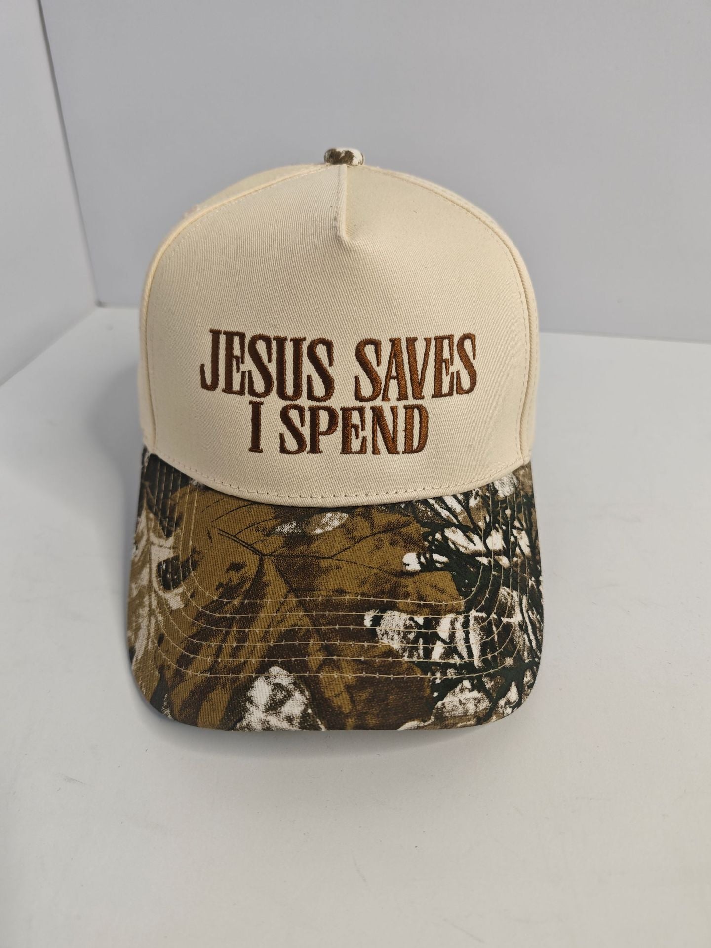 Embroidered JESUS SAVES I SPEND Baseball Cap