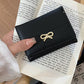 Lady's Purse With Bow Tie