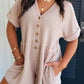Spiral Ribbed Short Sleeve V Neck Buttoned Romper with Pocket