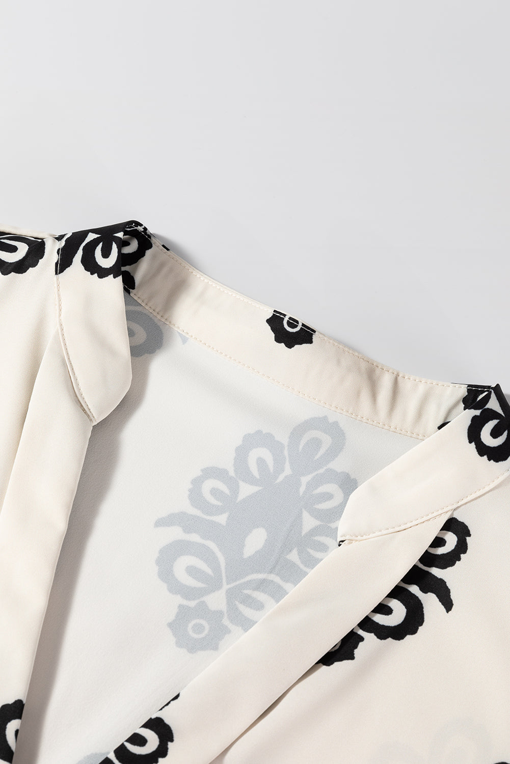 Geometric Print Short Sleeve V Neck Blouse