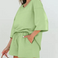 Meadow Mist Green Solid Loose V Neck Half Sleeve Tee and Shorts